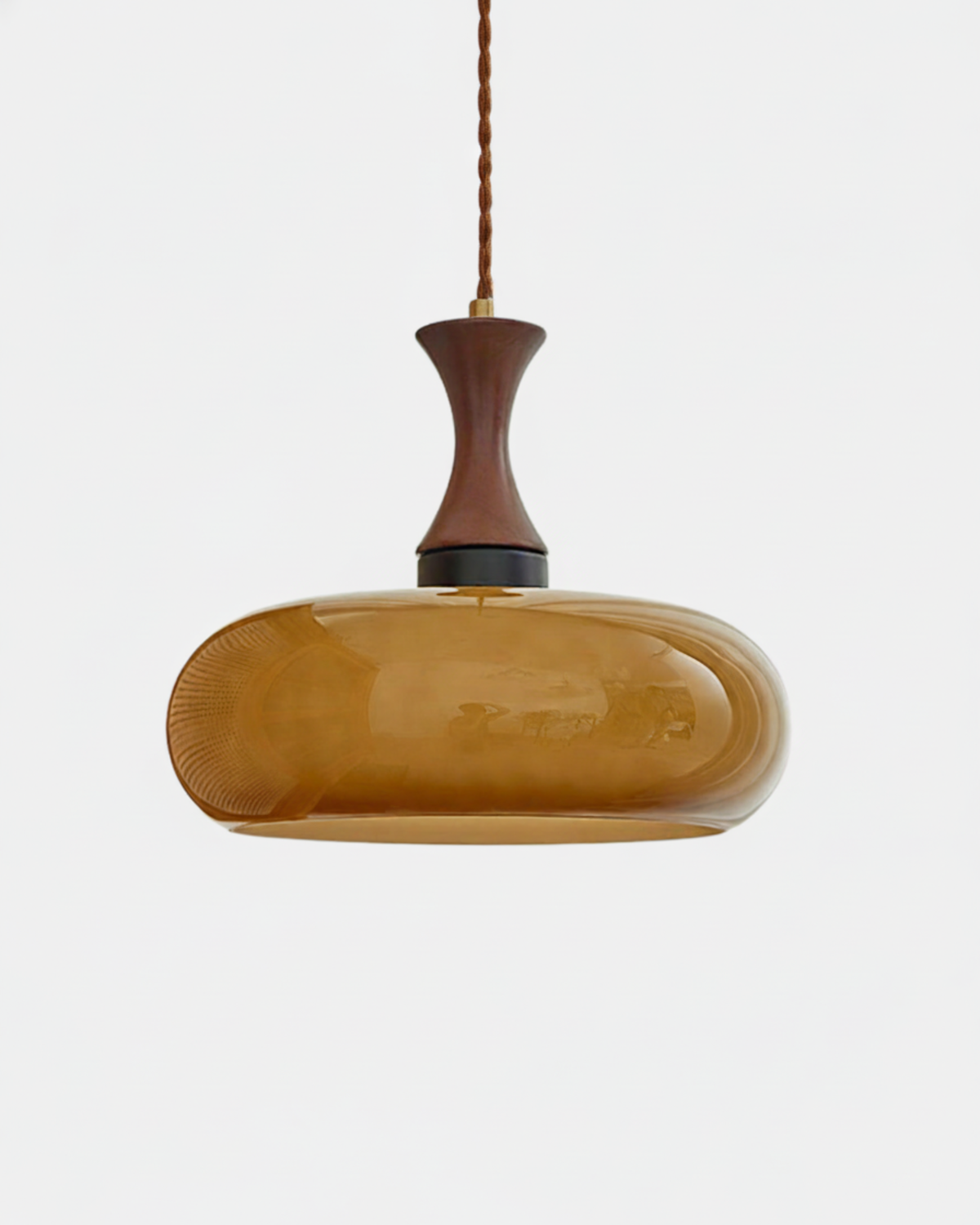 Ovia amber glass saucer pendant light with dark wood neck