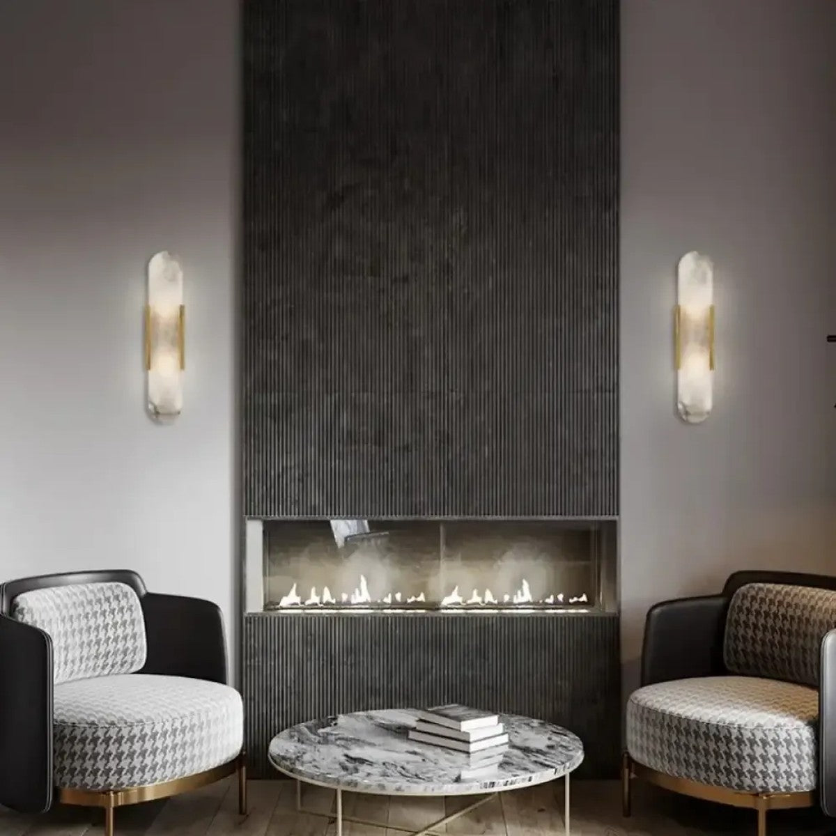 Pair of Pietra gold alabaster wall lights beside a fireplace