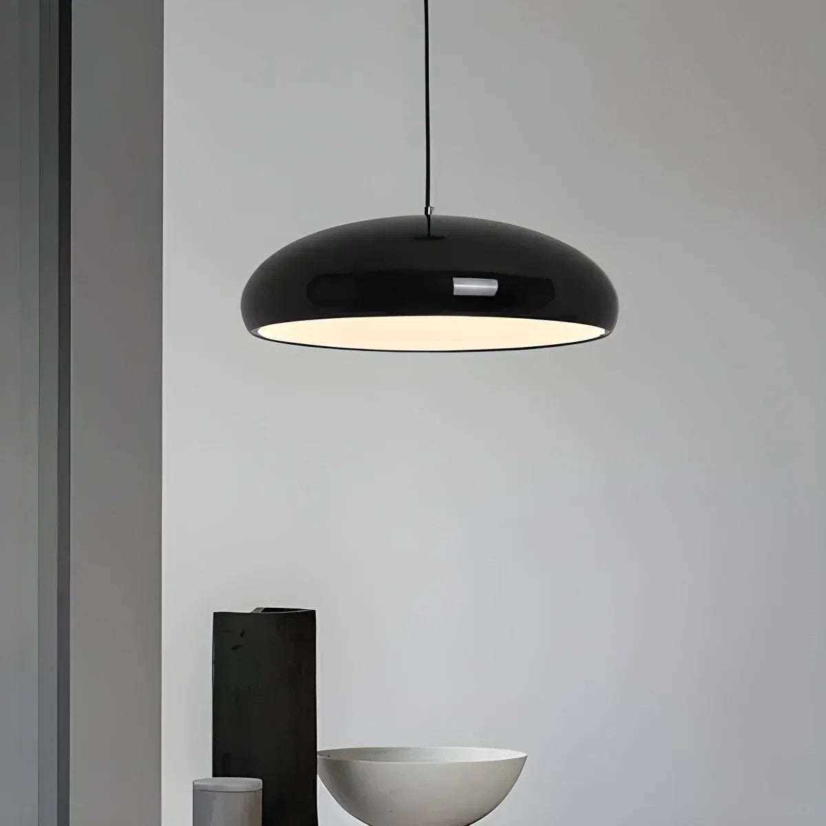 Black Lola glossy dome pendant light in a minimal interior