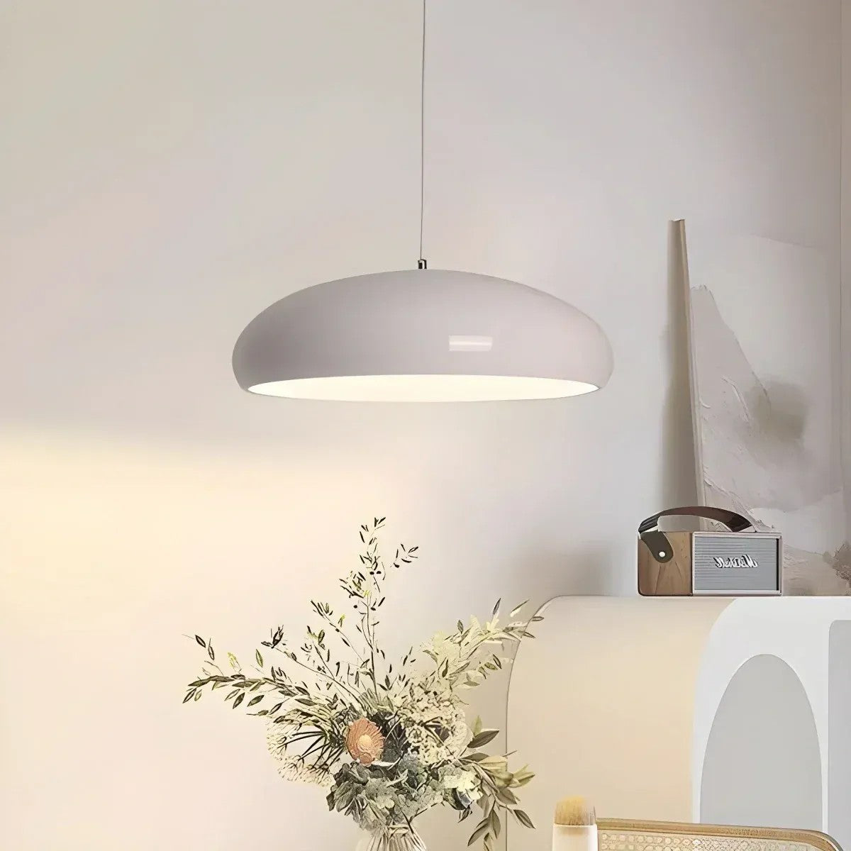 White Lola dome pendant light in a living room