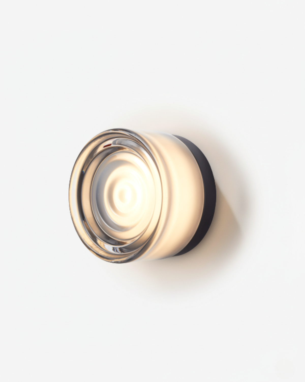 Orla round LED wall light with smoke grey ripple shade
