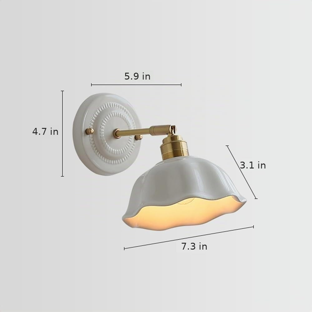 Celia wall sconce dimensions in inches: 7.3 in shade, 3.1 in high, 5.9 in projection, 4.7 in wall plate