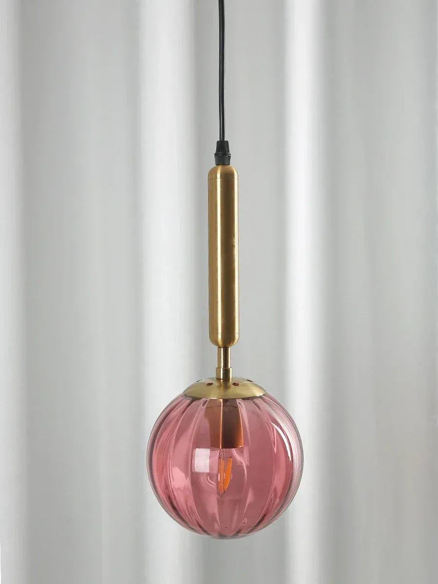 Coco glass globe pendant light, gold stem with pink ribbed glass