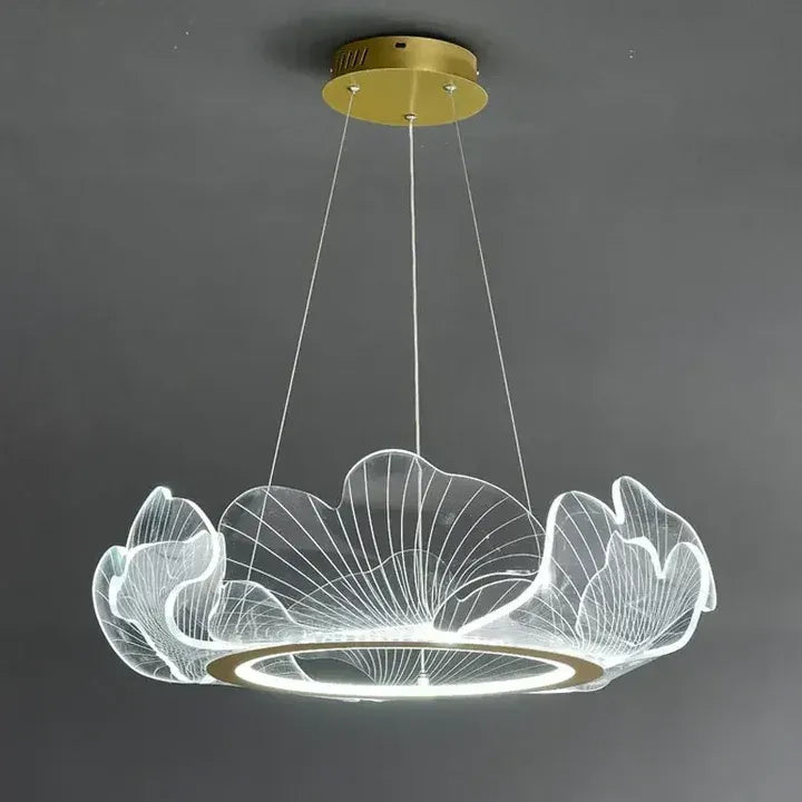 Elara gold ginkgo leaf ring chandelier illuminated with cool white light