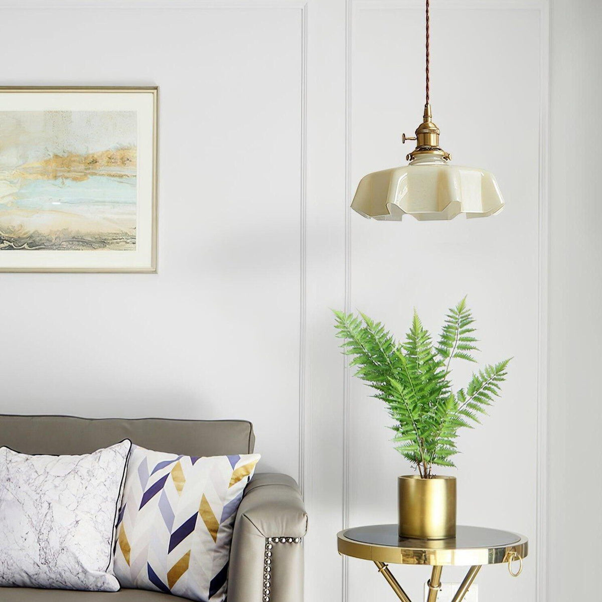 Fleur cream glass pendant light in a bright living room corner