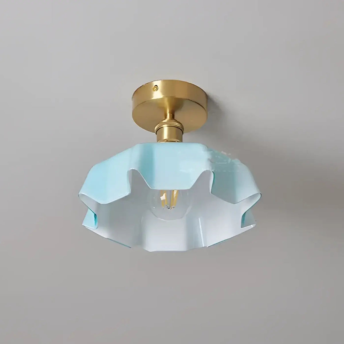 Fleur scalloped glass semi-flush ceiling light in blue with brass-finish mount
