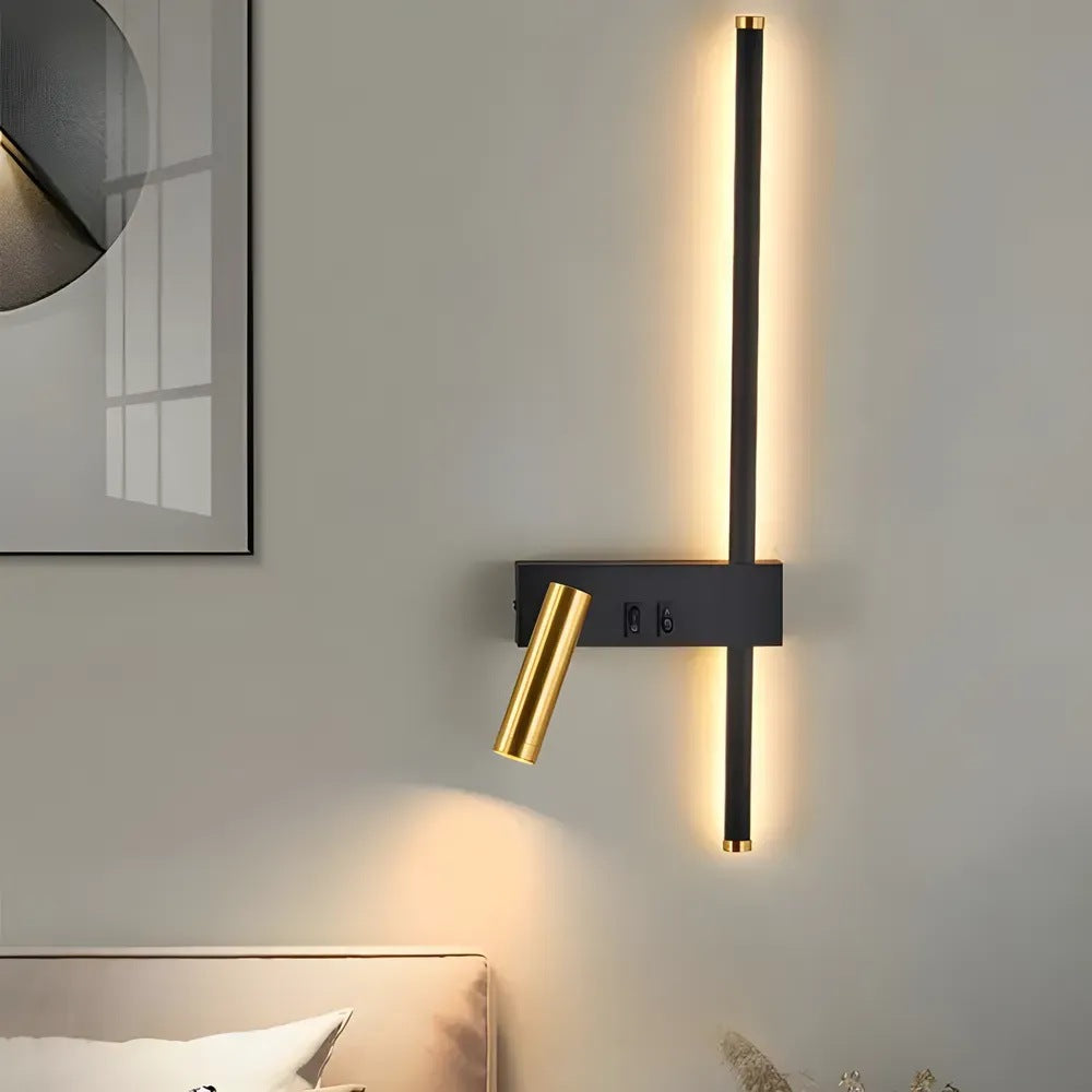 Lumia black and gold LED wall reading light above a bed headboard