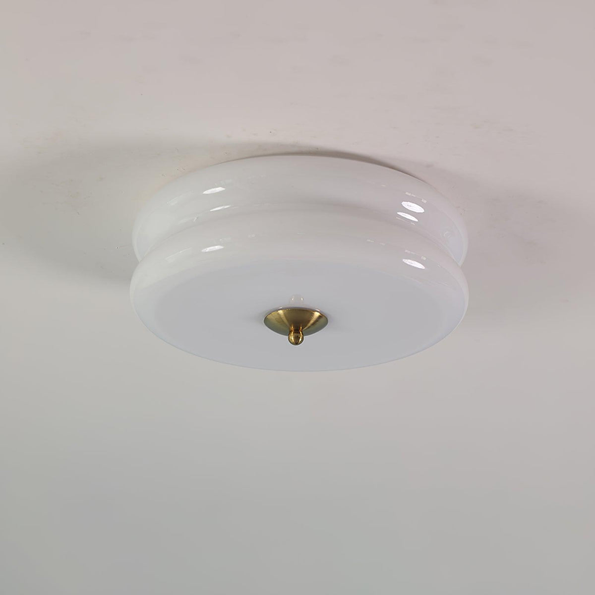 Margot flush mount ceiling light, white glass with gold finial