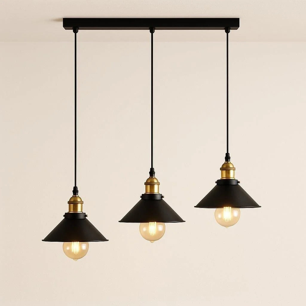 Orrin industrial 3-light cone pendant on a black linear bar with brass sockets