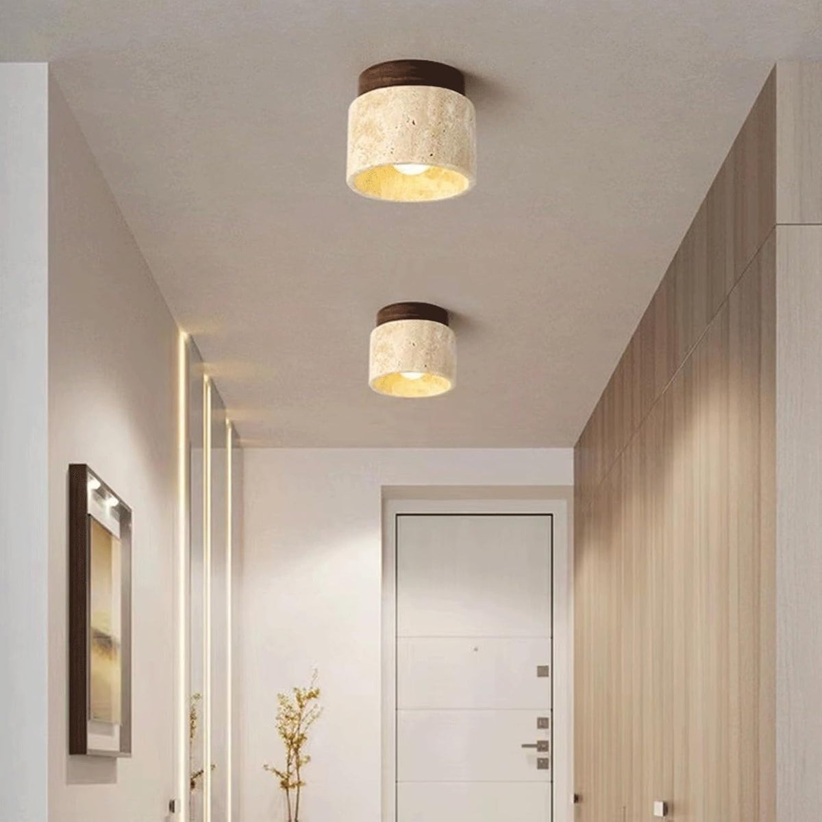 Tova travertine flush mount ceiling lights along a hallway