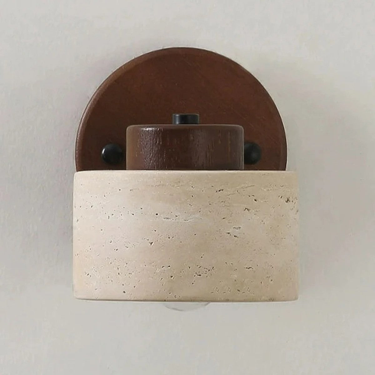 Cairn travertine swivel wall sconce with walnut plate and black details
