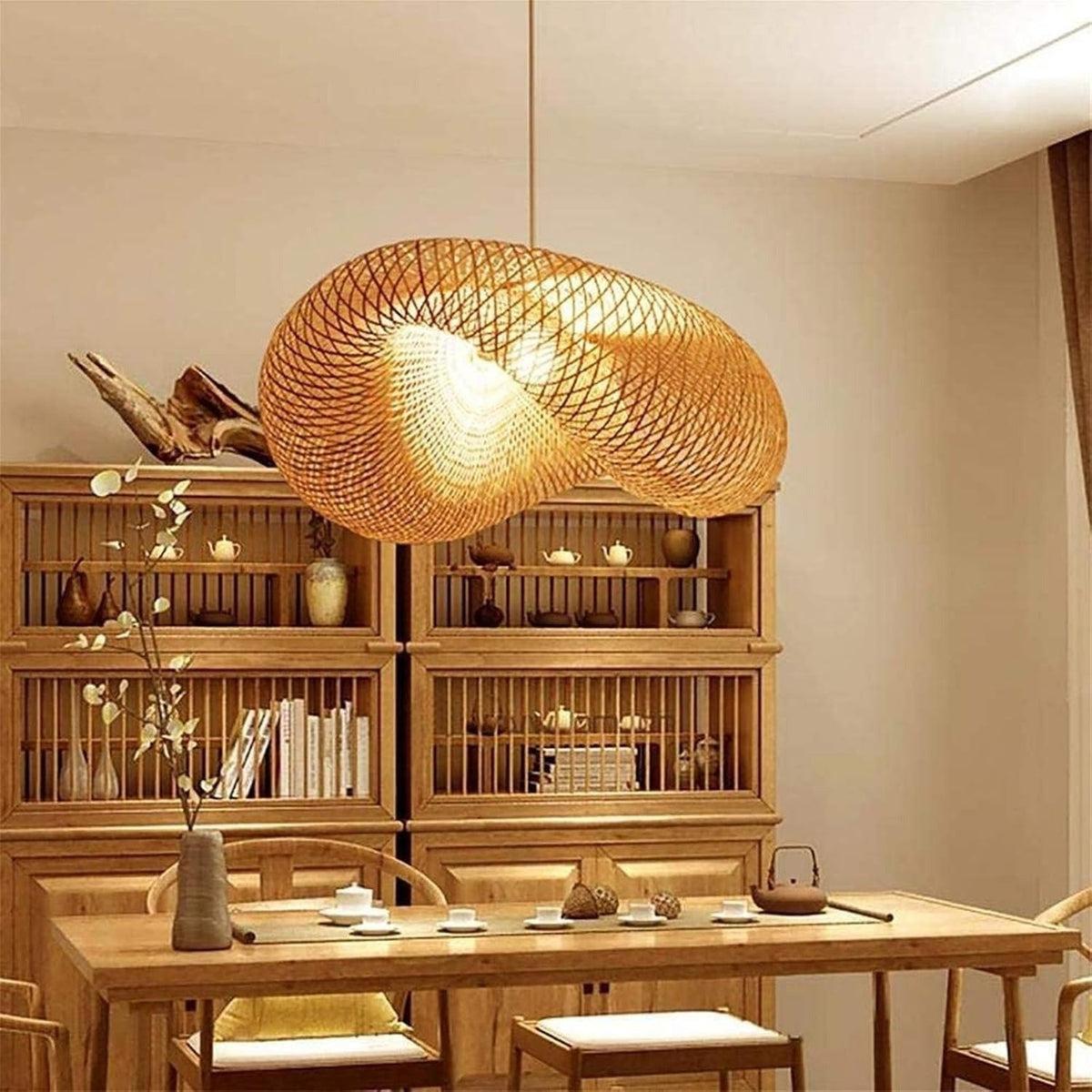 Nami bamboo wave pendant light over a wooden dining table