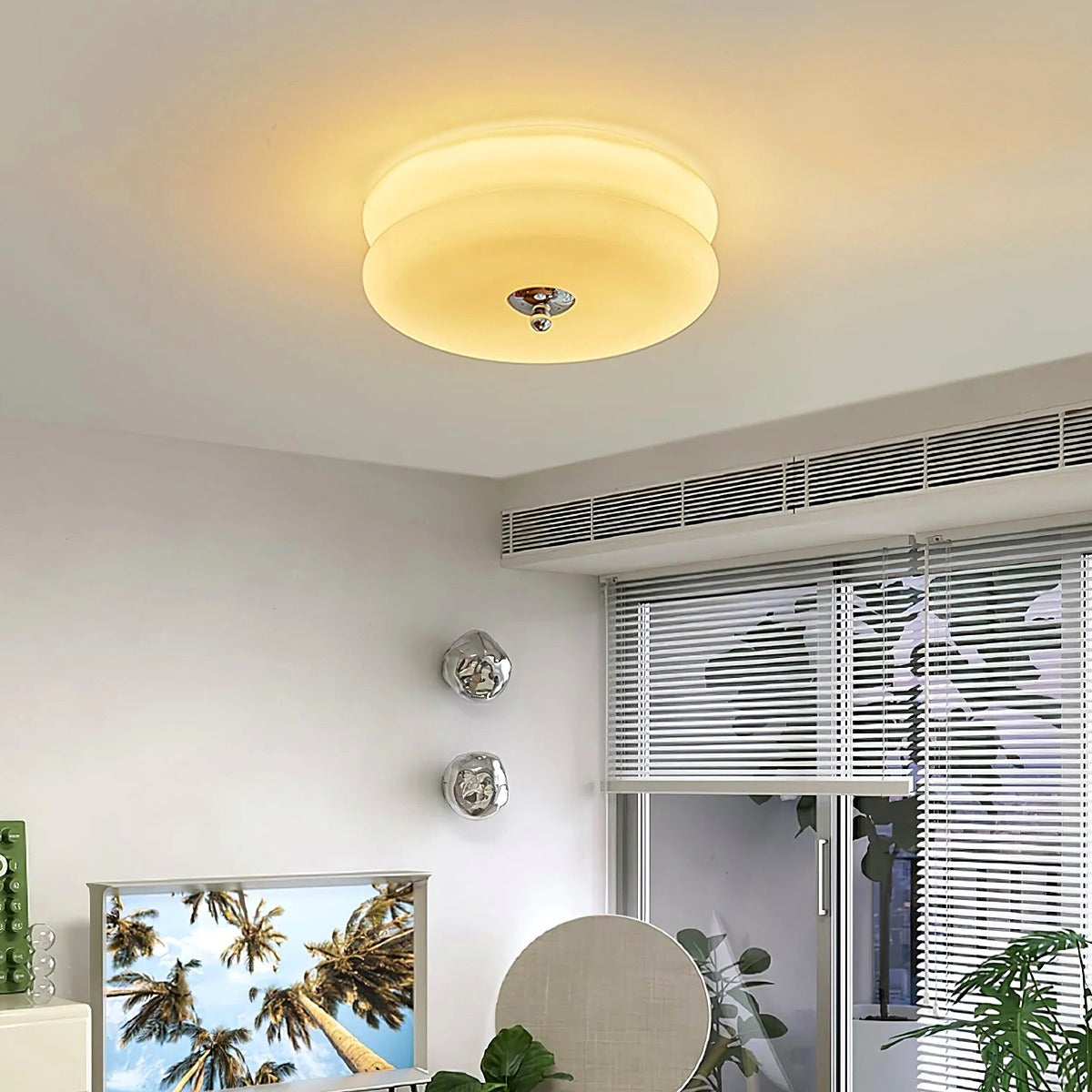 Margot ribbed glass flush mount lit with a warm glow in a living room