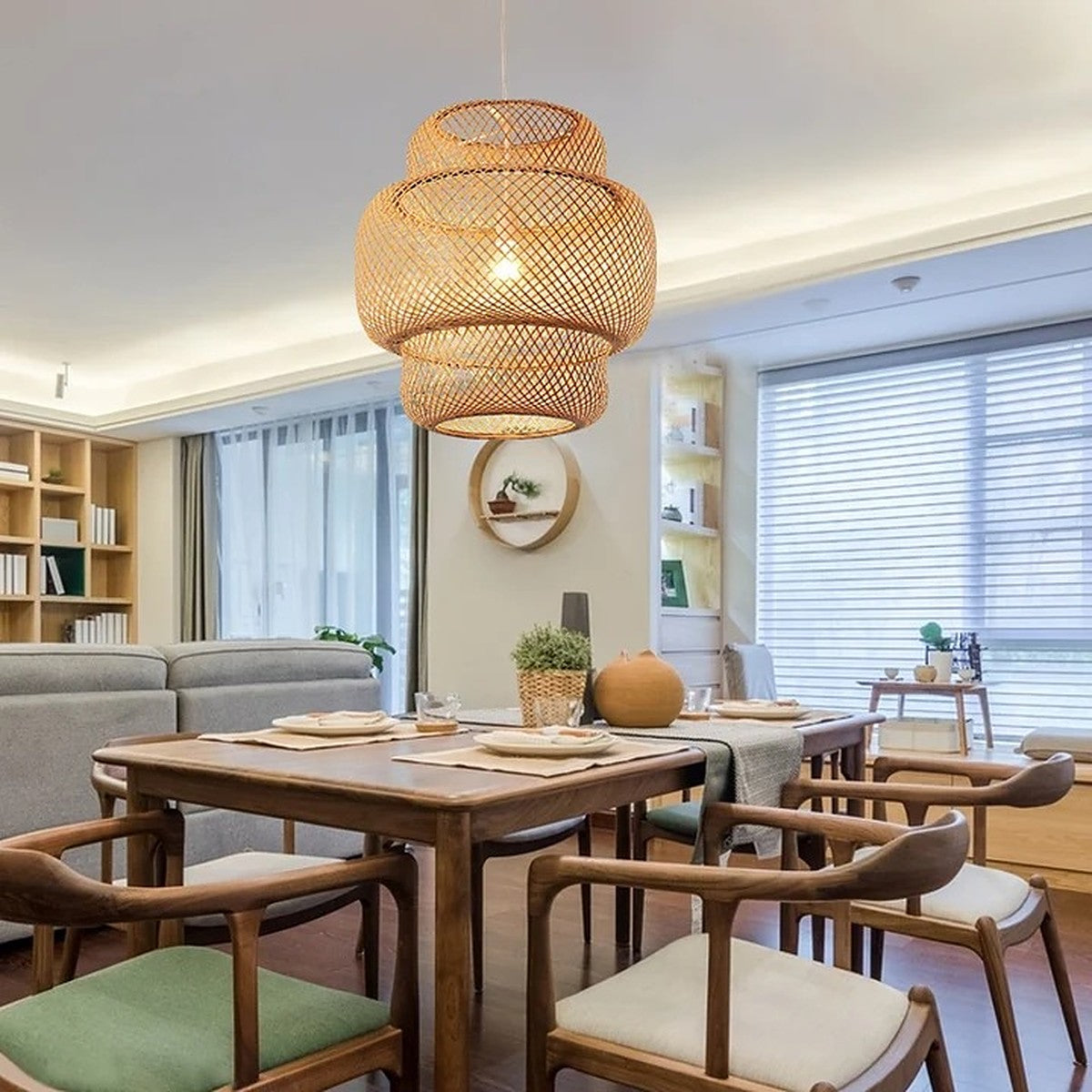 Toki woven bamboo pendant light above a dining table
