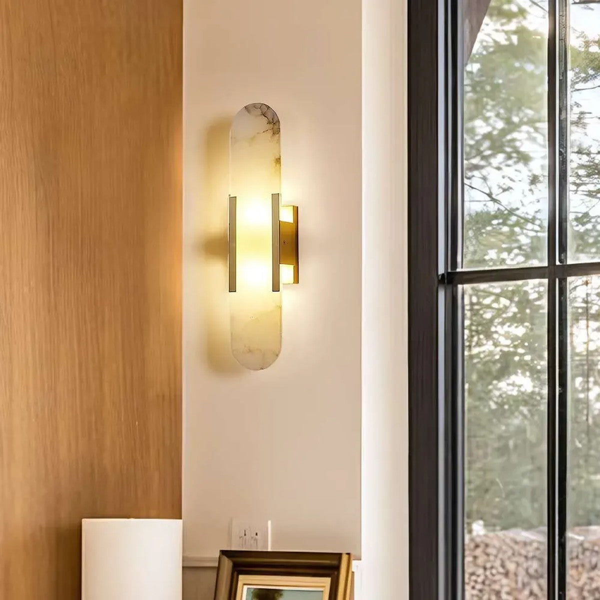 Pietra gold alabaster wall light on a timber wall