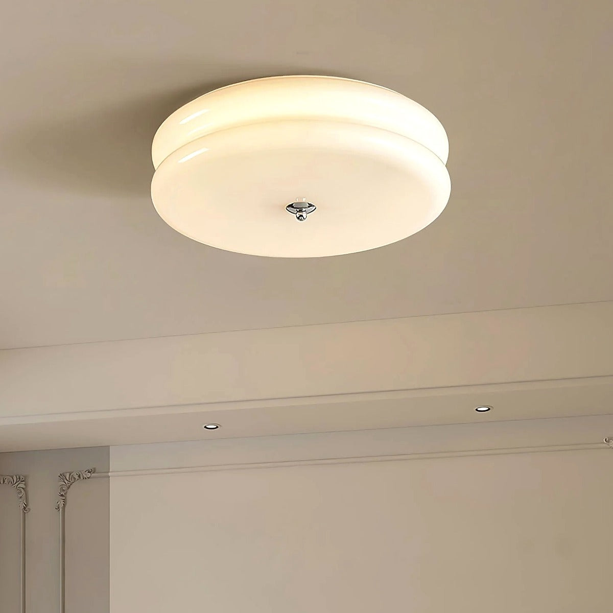 Margot white glass flush mount lit in a classic interior