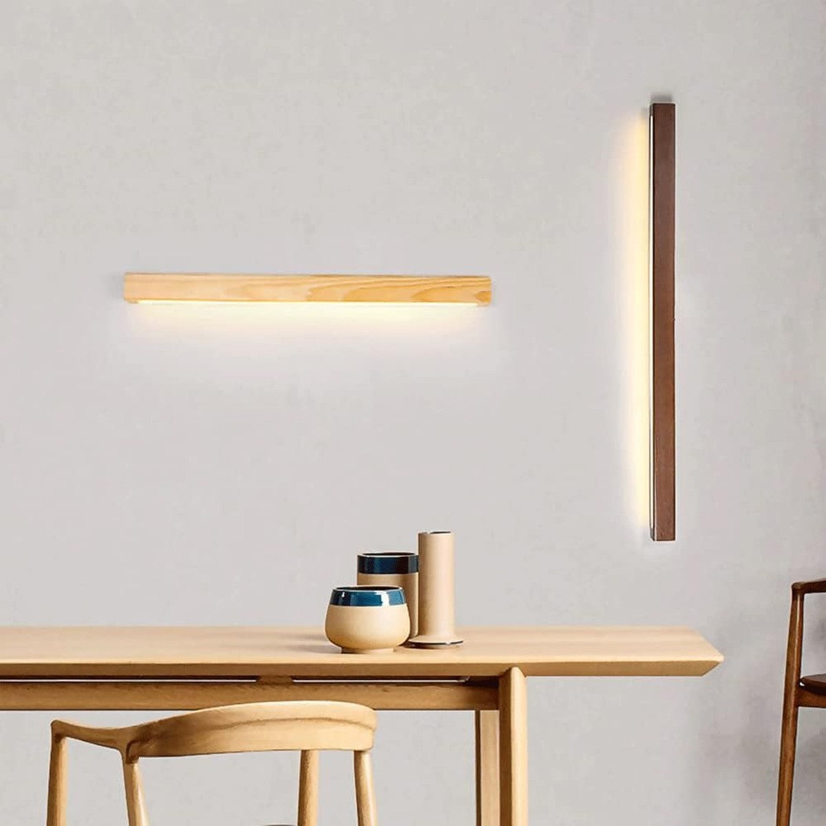 Kauri linear wall lights in natural wood and walnut in a study