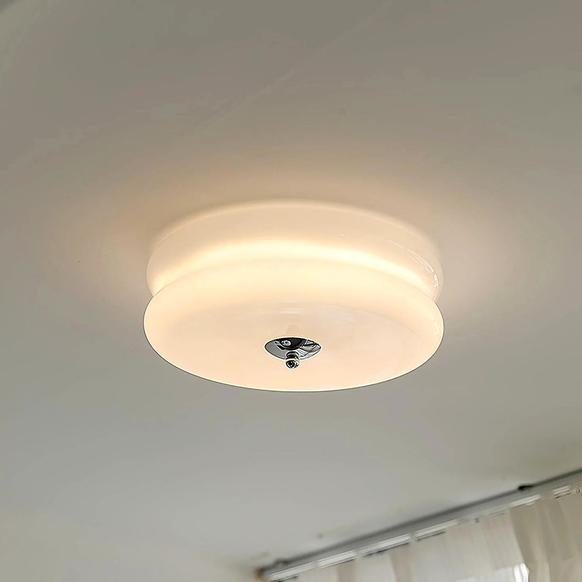 Margot Art Deco flush mount giving a soft warm white glow