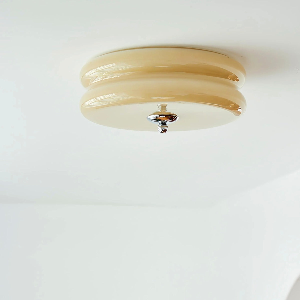 Margot beige ribbed glass flush mount on a white ceiling