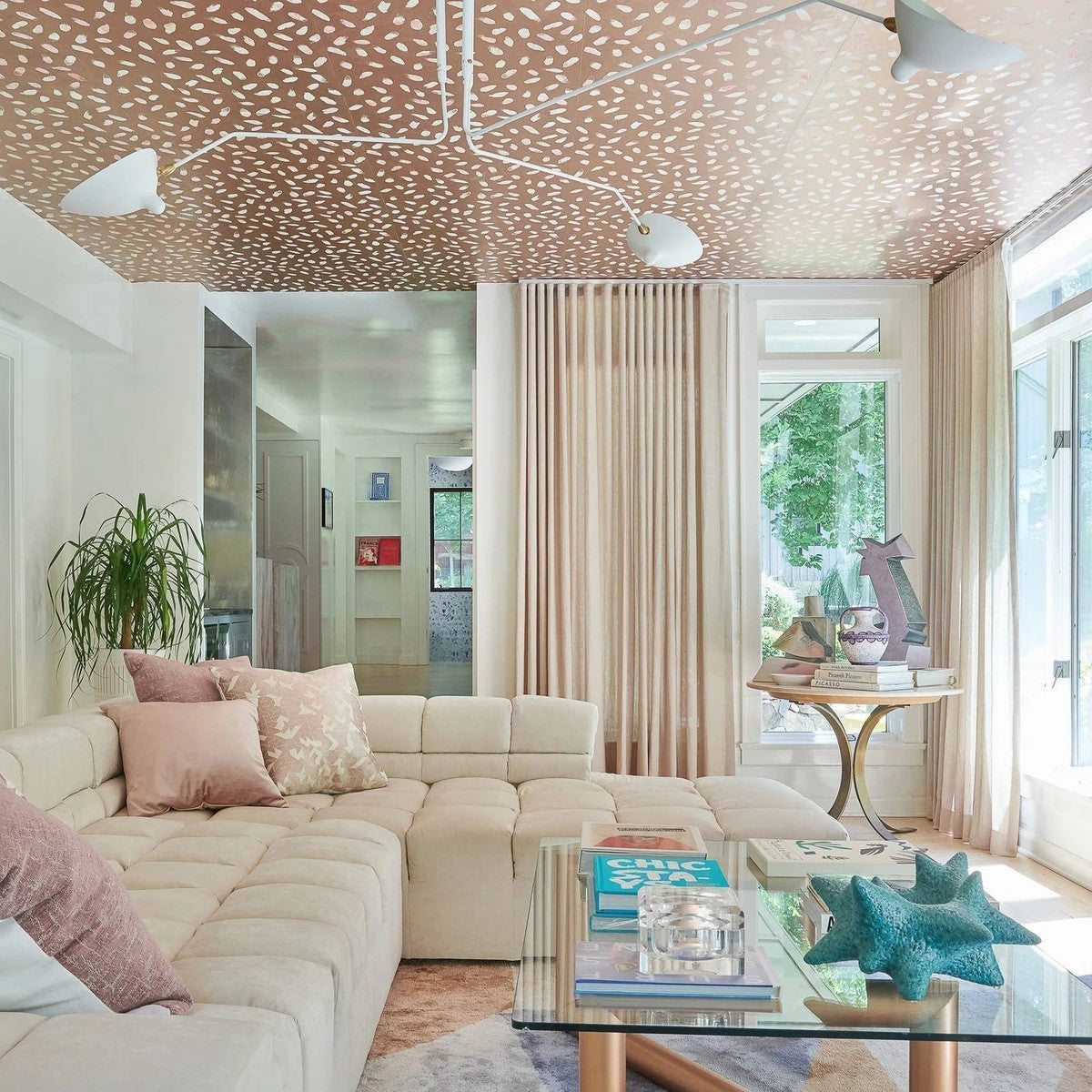 Corella white multi-arm ceiling light in a living room