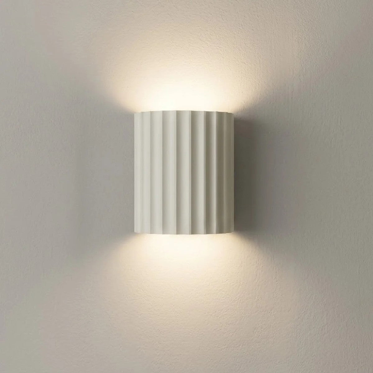 Nell fluted wall sconce in matte white