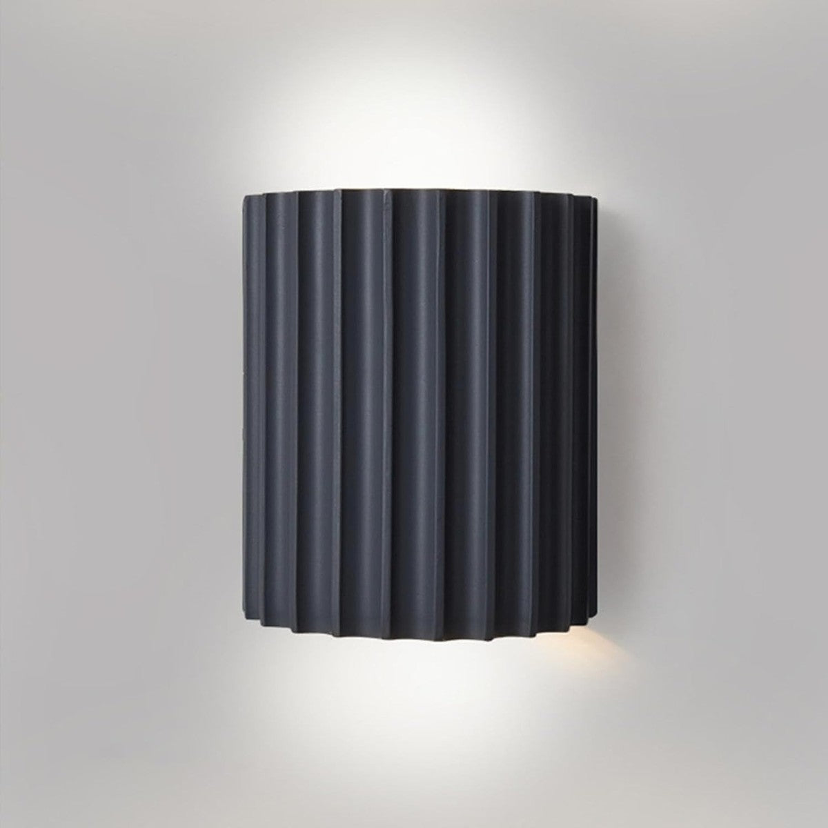 Nell fluted wall sconce in matte black