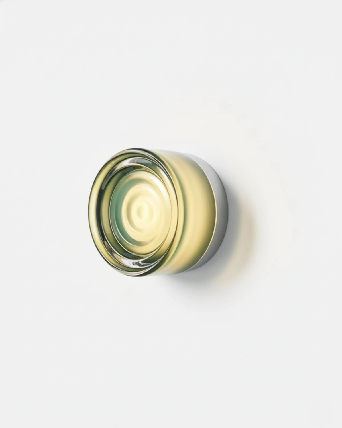 Orla round LED wall light with green ripple shade