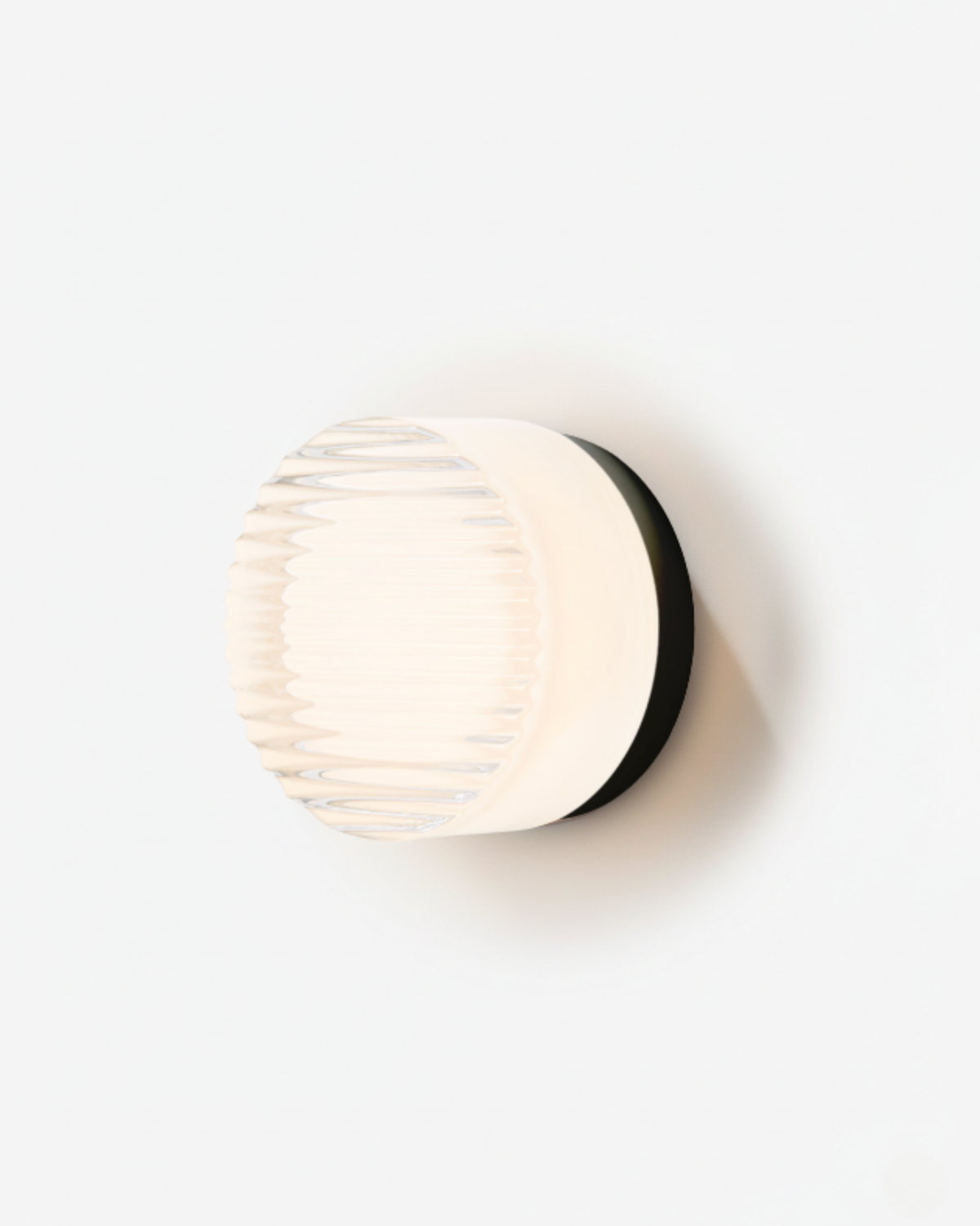 Orla round LED wall light with white ribbed shade