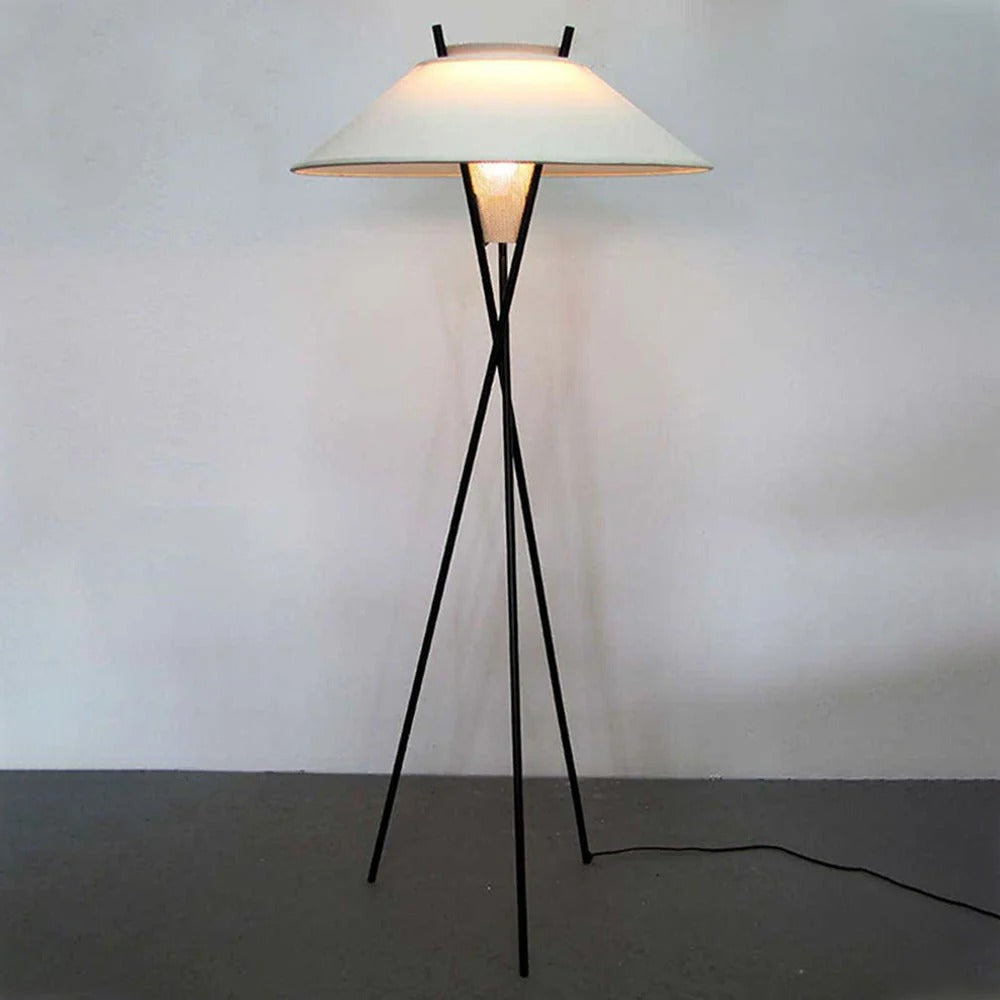 Archi black tripod floor lamp lit, white fabric shade, full view
