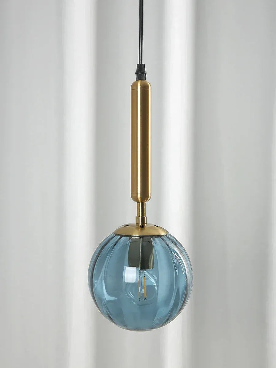 Coco glass globe pendant light, gold stem with blue ribbed glass