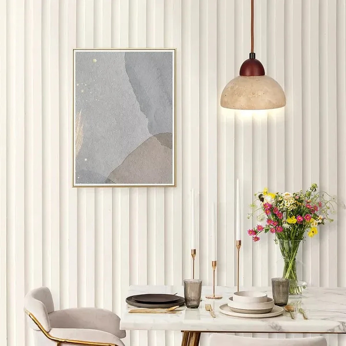 Cora travertine dome pendant light with a walnut cap above a dining table