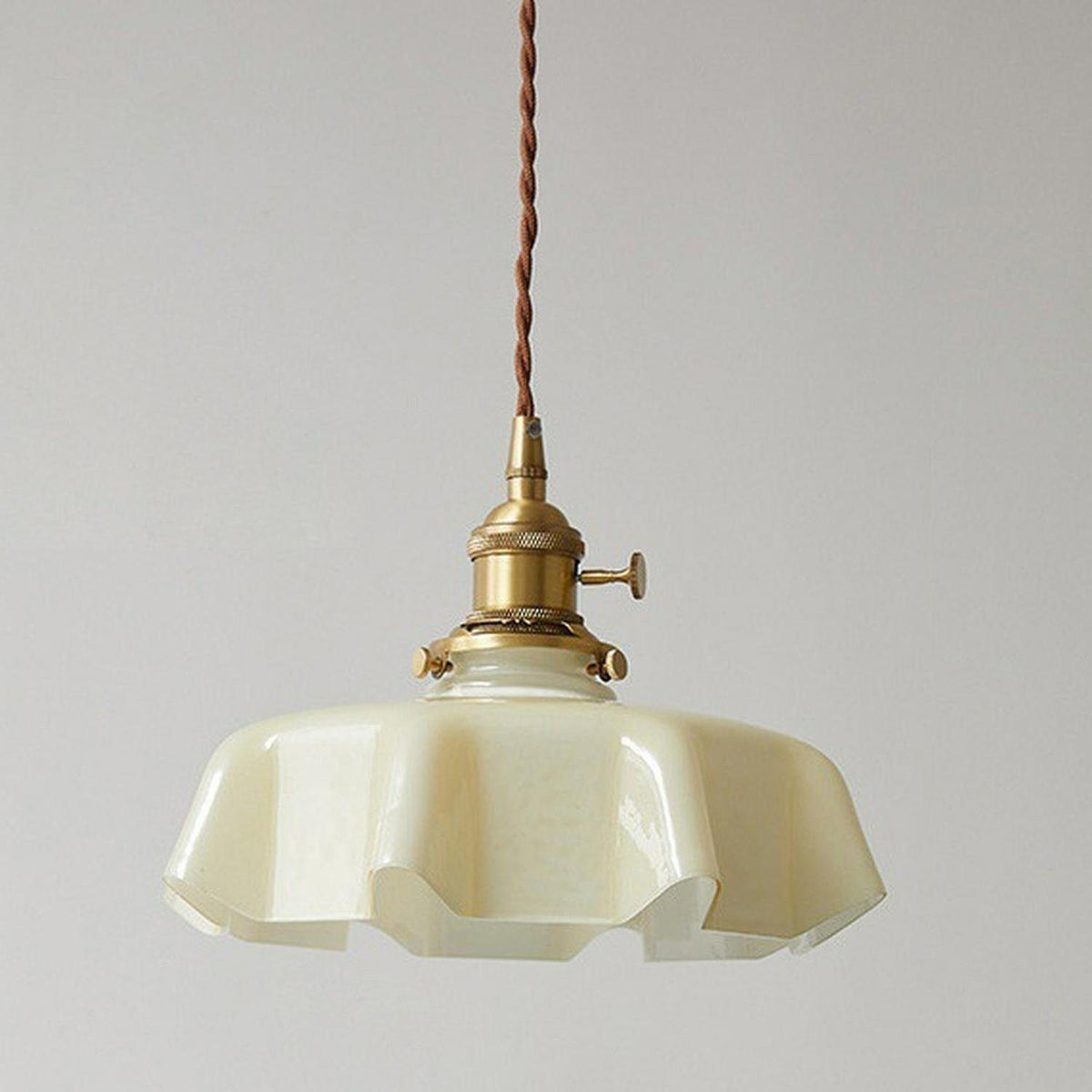 Fleur scalloped glass pendant light in cream with brass socket