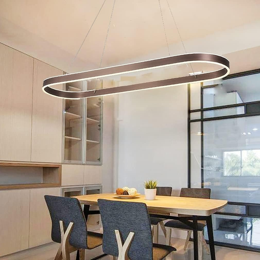 Halo oval LED pendant light in coffee brown over a dining table