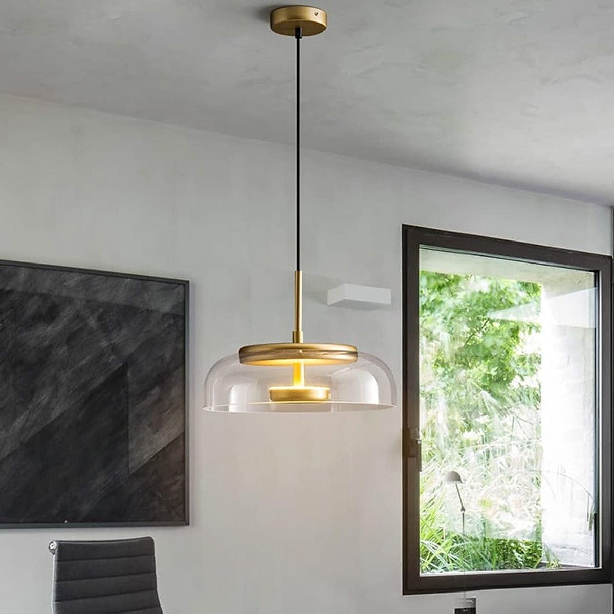 Ivy clear glass pendant light in a home office