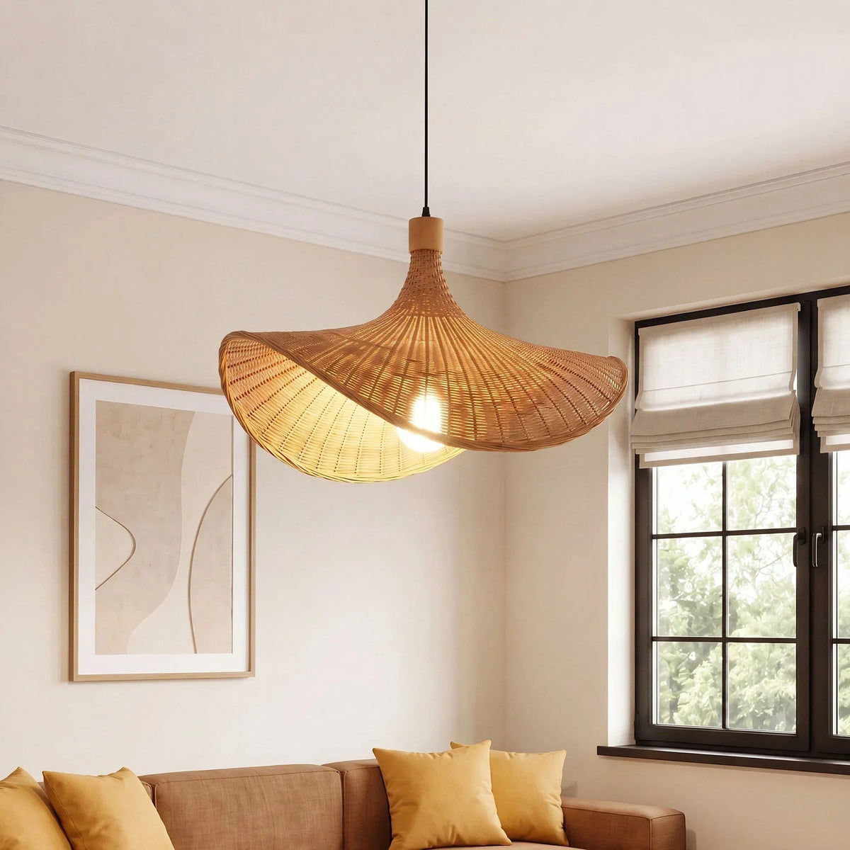 Kasa woven bamboo hat pendant light glowing above a sofa in a cream living room