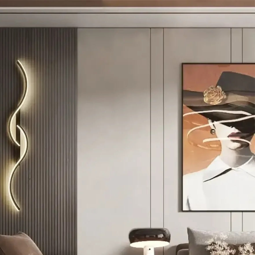 Lyra black wave LED wall sconce on a slatted living room wall