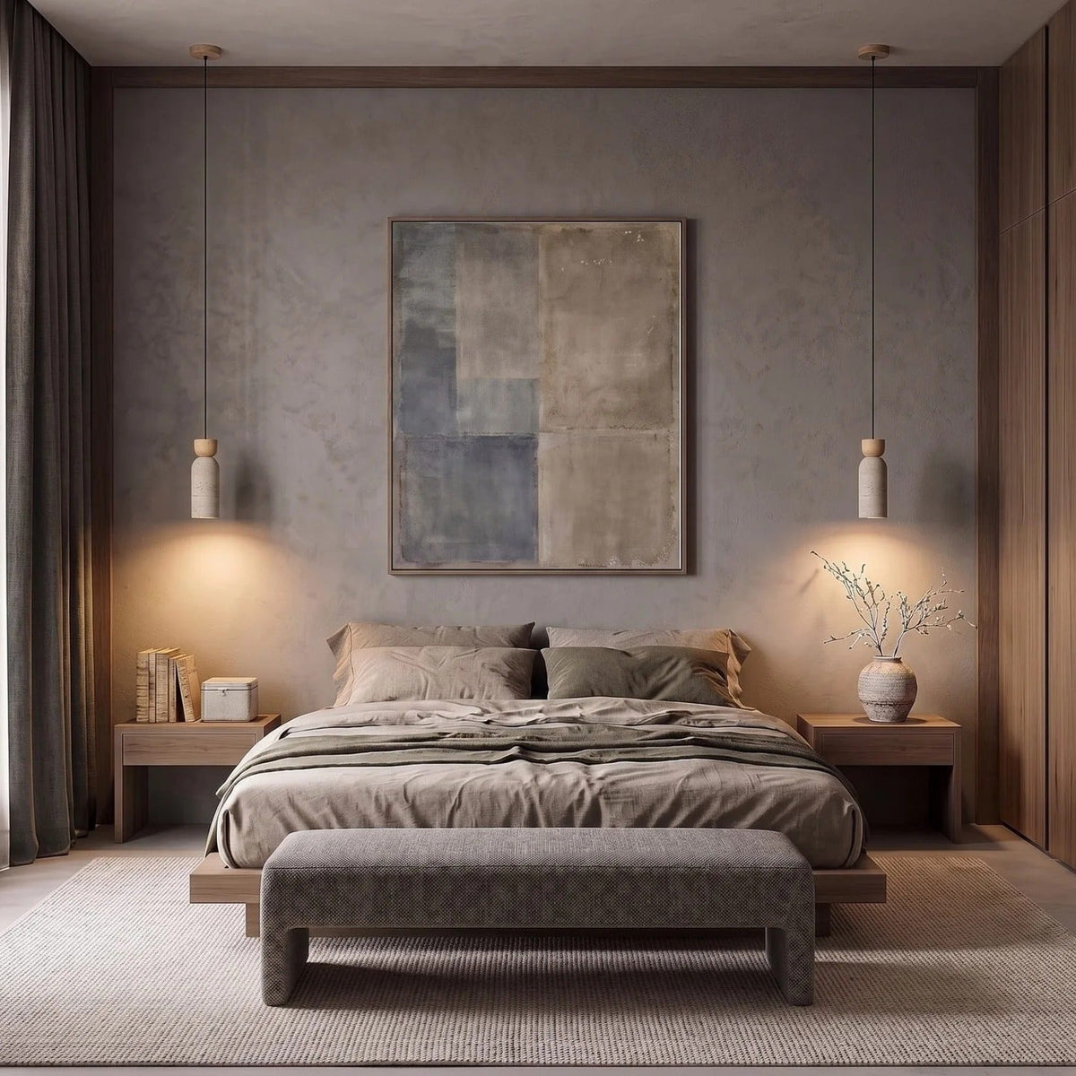 Pair of Pia travertine mini pendant lights with light wood caps on each side of a bed