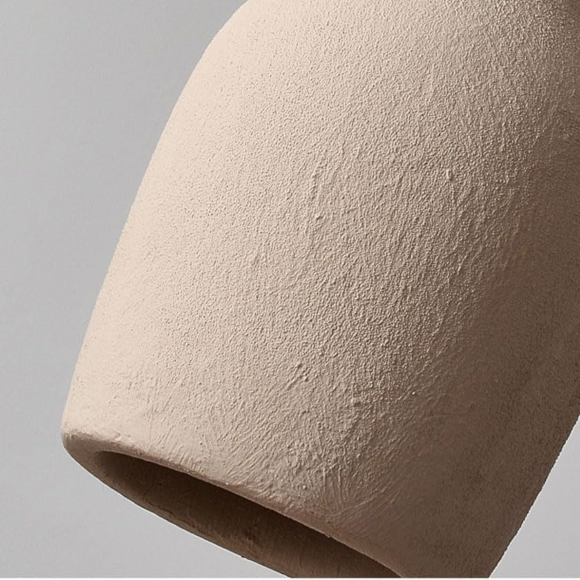 Close-up of the sand-textured surface of the Suna vase pendant