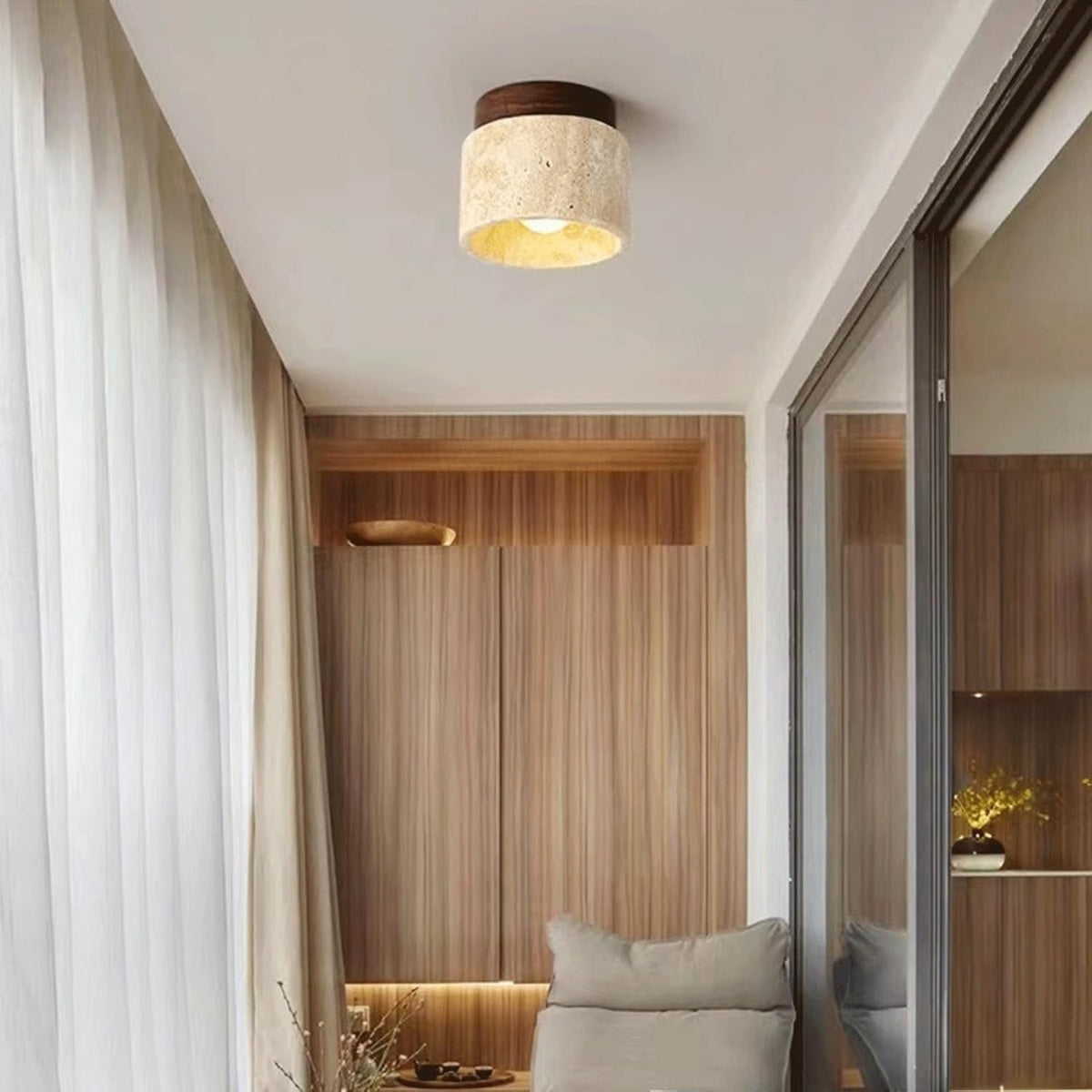 Tova travertine flush mount ceiling light in a bright living room