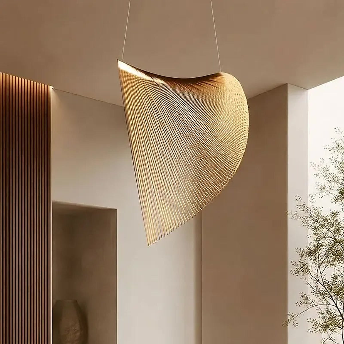 Wren sculptural pendant light seen from below in a bright living space with wood slats